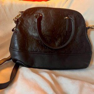 Black purse with floral design